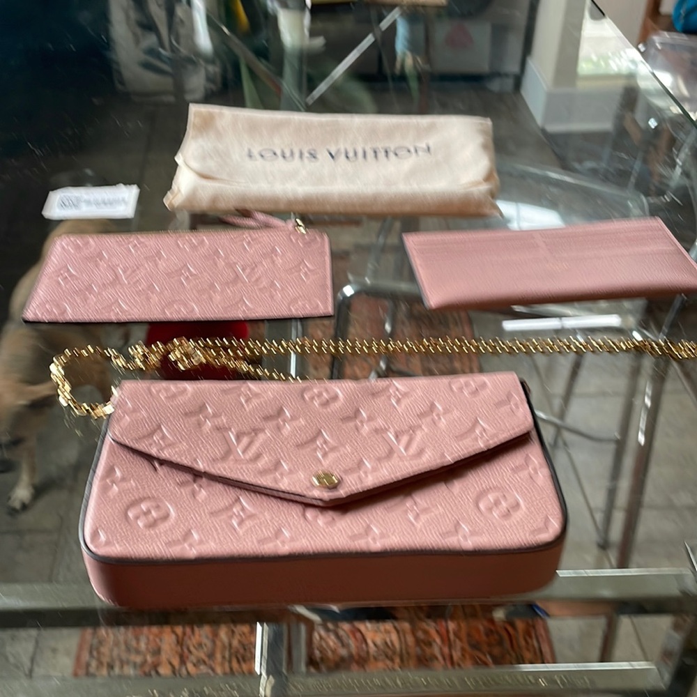 Louis  Vuitton felicite pochette. In pristine condition,  ever carried.
